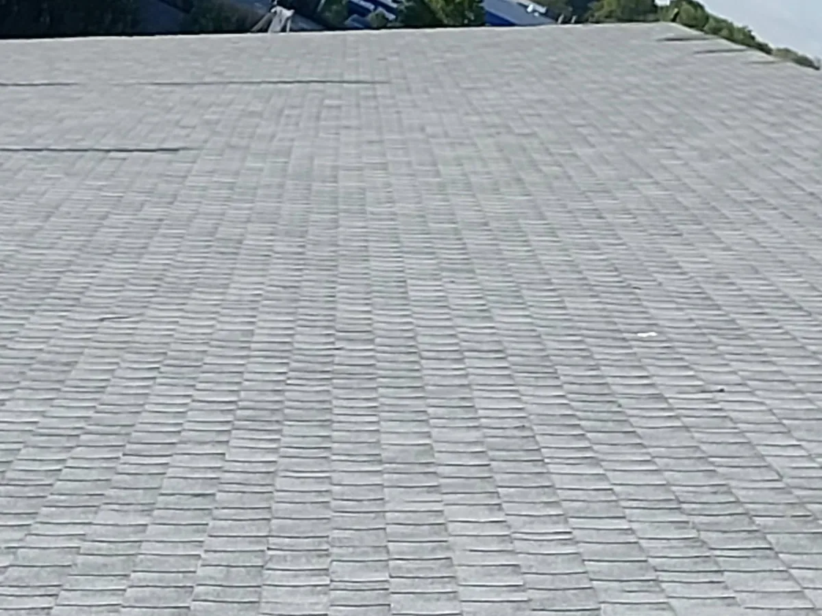 Gray architectural asphalt shingles on a finished roof